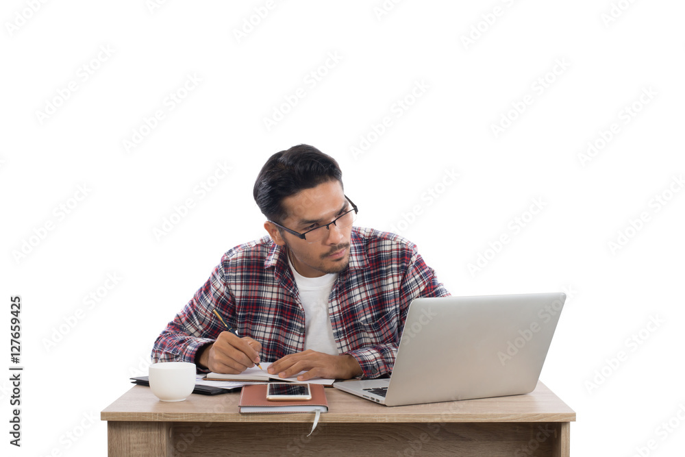 Young businessman working with his laptop isolated on white back
