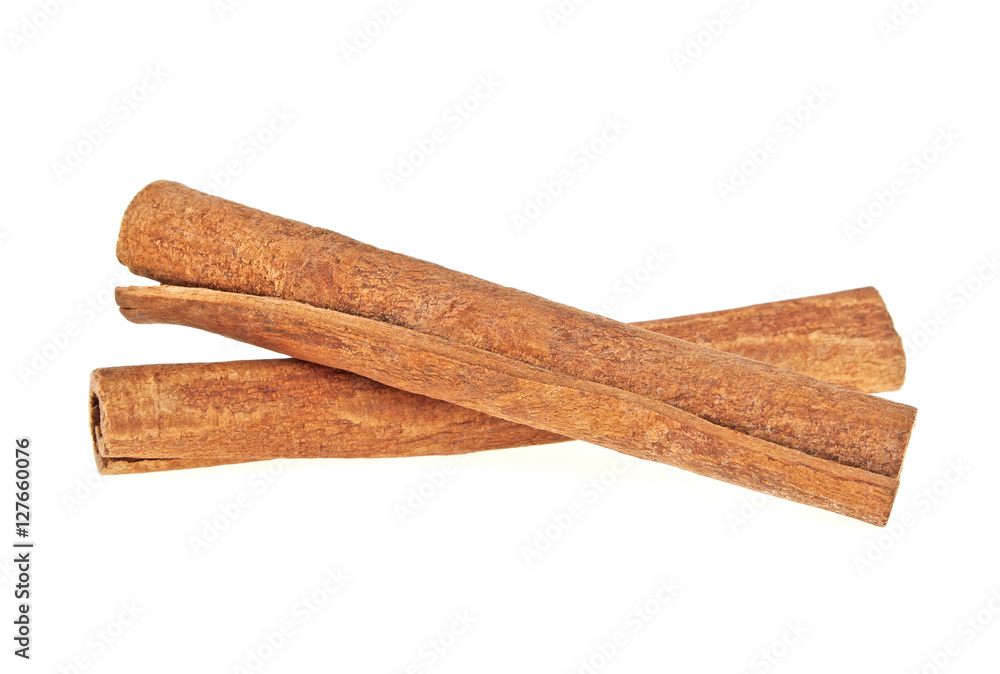 Two cinnamon sticks isolated on white background Two cinnamon sticks isolated on white background