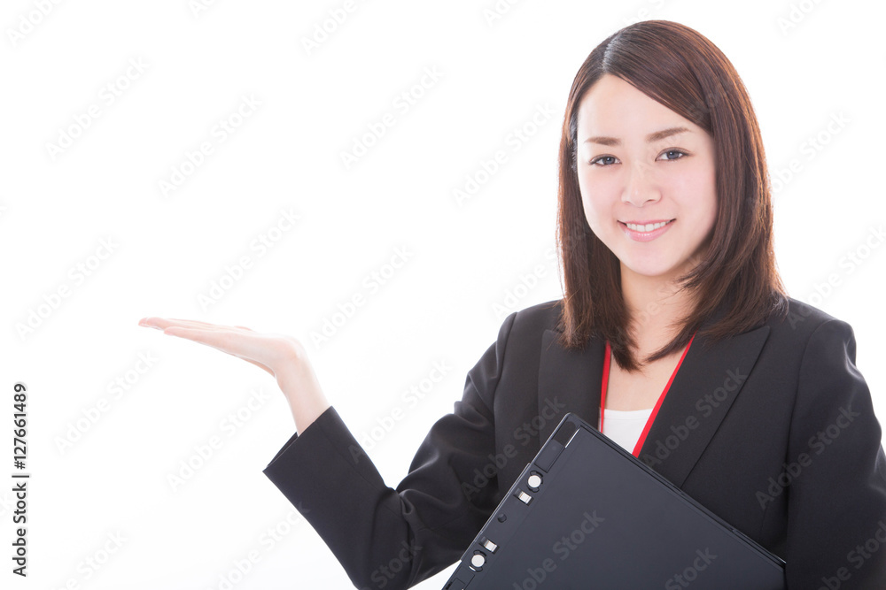Smiling business woman showing on copyspace Smiling business woman showing on copyspace