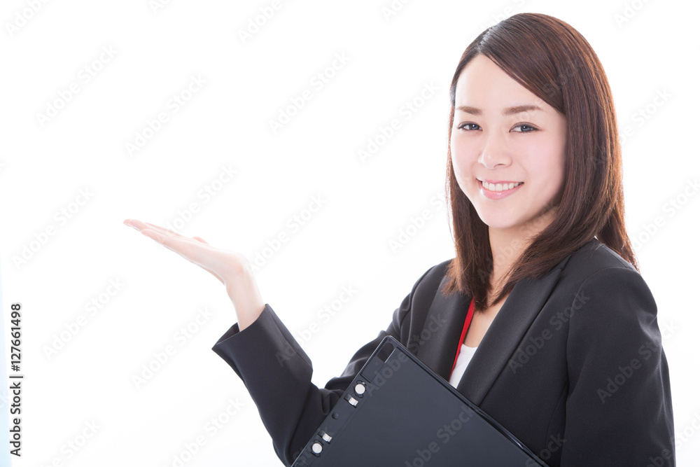 Smiling business woman showing on copyspace Smiling business woman showing on copyspace
