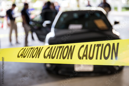 caution tape protect vehicle in crime scene investigation training