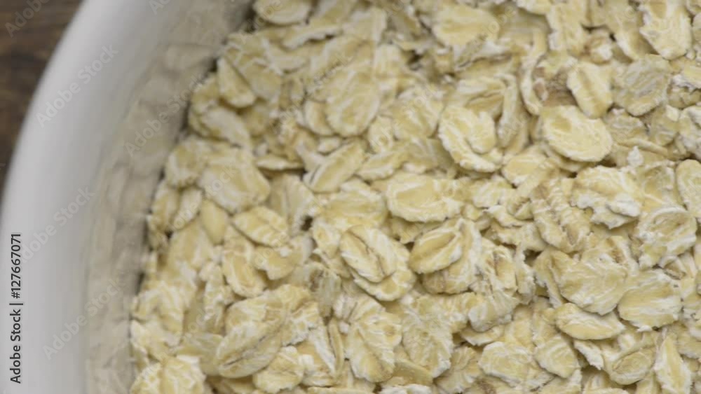 Oat flakes in close up. Film clip with sliding motion. Oat flakes in close up. Film clip with sliding motion.