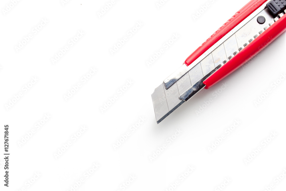 Red paper knife isolated on white background Red paper knife isolated on white background