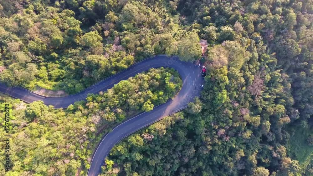 Aerial Views Flight over the Mountains. Flying over the River. Forest Valley. Morning Fog. The road up the hill. Doi Suthep Chiangmai Thailand. Aerial Views Flight over the Mountains. Flying over the River. Forest Valley. Morning Fog. The road up the hill. Doi Suthep Chiangmai Thailand.