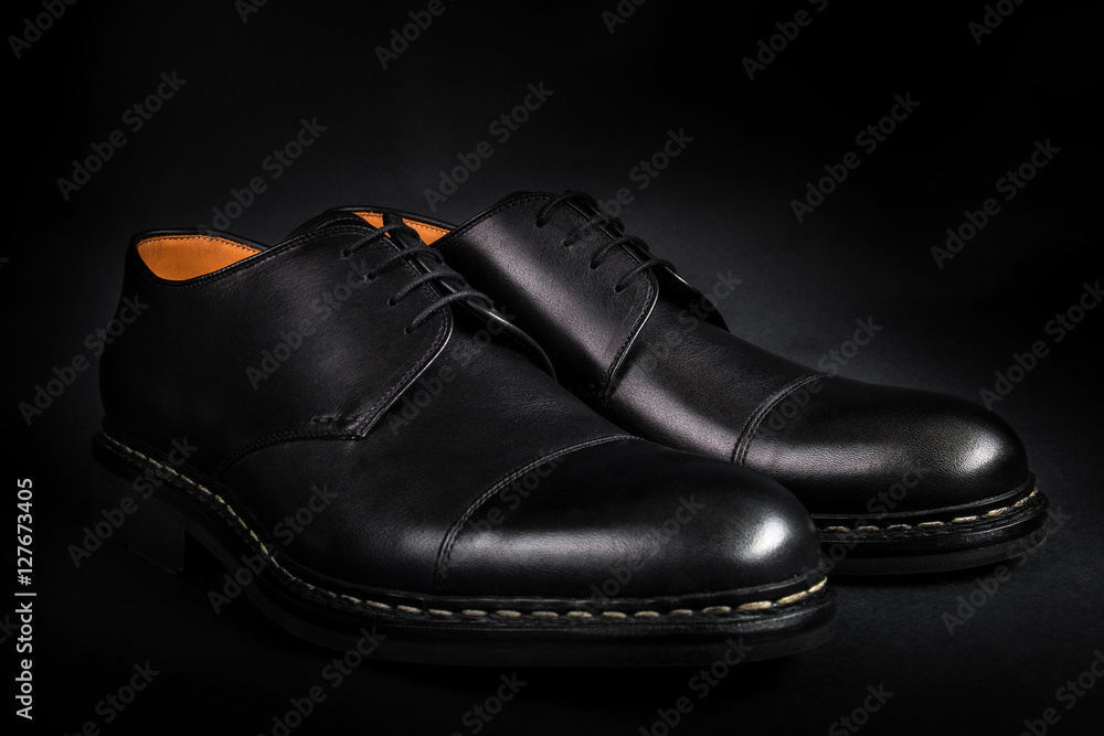 Black oxford shoes on background. Back view. Close up. Black oxford shoes on background. Back view. Close up.