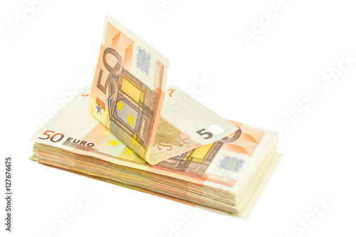 Stack of euro notes on white background