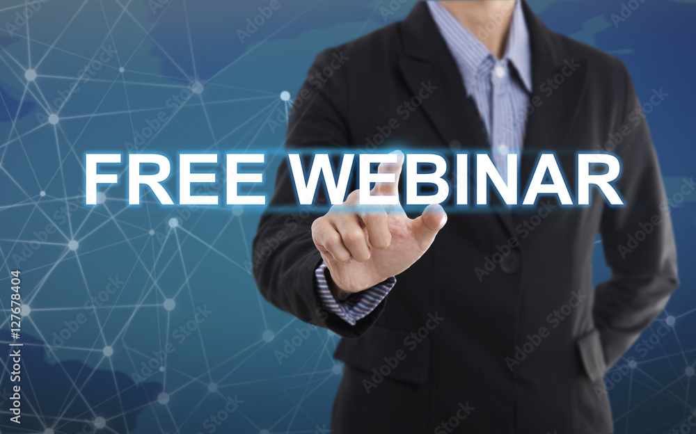 Businessman hand pressing button free webinar. sign on virtual screen. business concept. Businessman hand pressing button free webinar. sign on virtual screen. business concept.