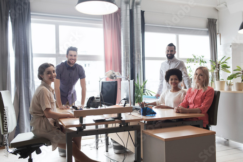 happy creative team in office