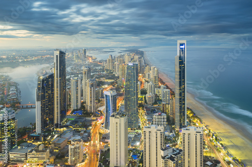 Wallpaper Mural Illuminated modern buildings at riverside during sunset Torontodigital.ca