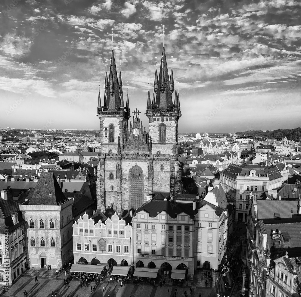 Old Town Square with Church of Our Lady before Tyn in eastern european Czech capital Prague - view from Town Hall, monochrome black and white image