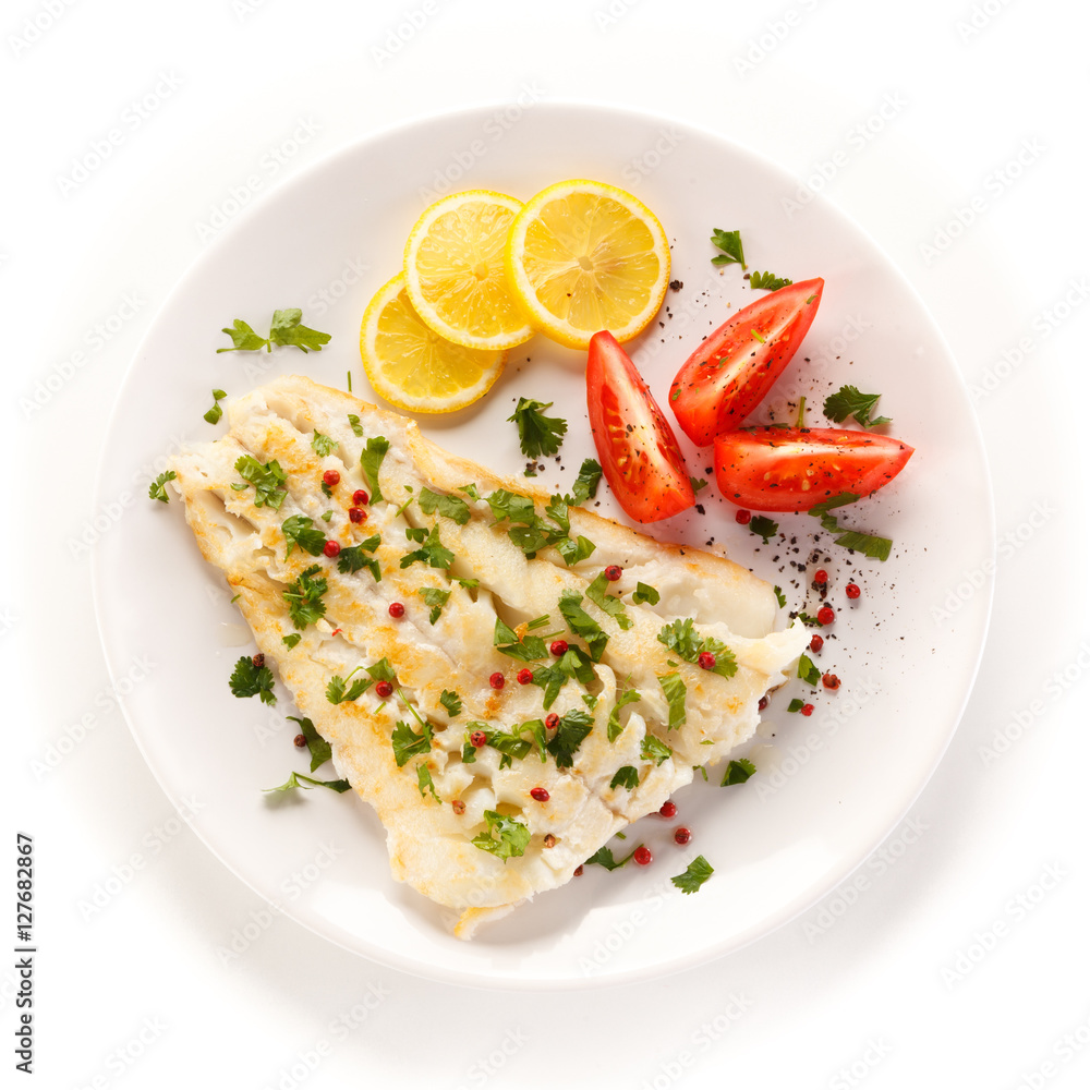 Fish dish - fried fish fillet and vegetables Fish dish - fried fish fillet and vegetables
