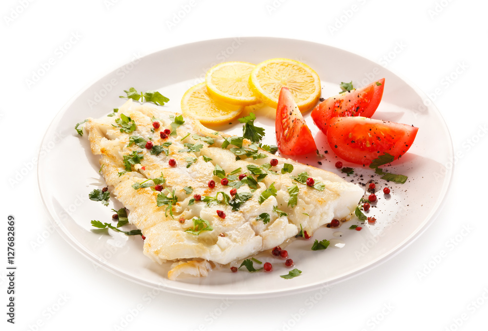 Fish dish - fried fish fillet and vegetables Fish dish - fried fish fillet and vegetables