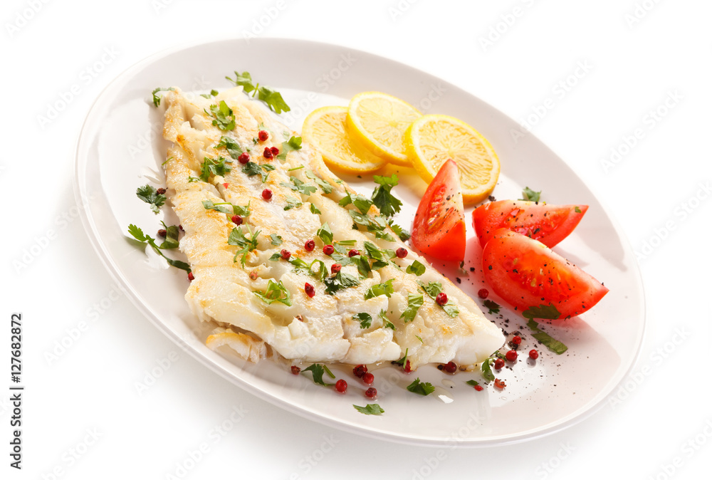 Fish dish - fried fish fillet and vegetables Fish dish - fried fish fillet and vegetables