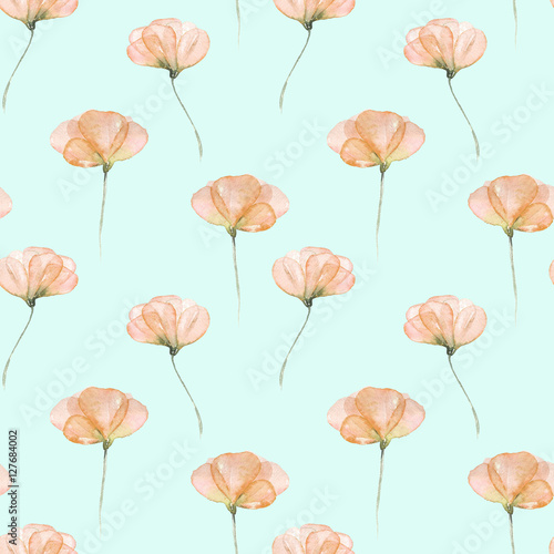 Seamless floral pattern with pink tender flowers hand drawn in watercolor on a blue background