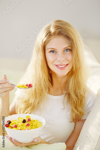 Girl eating corn flakes