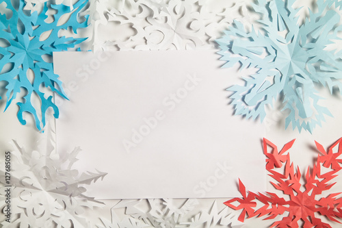 Christmas background with colourful snowflakes.