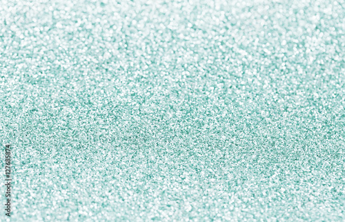 Abstract silver background with glitter and sequins.