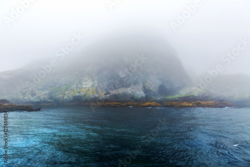 Majestic sea and  rocks in heavy fog © maylat