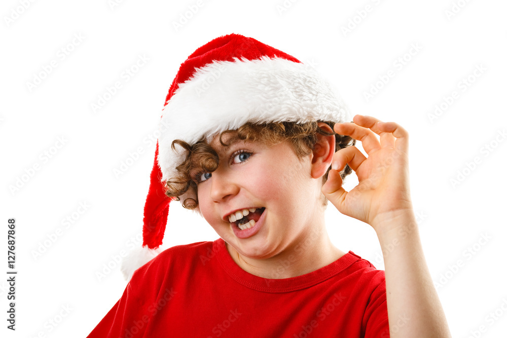 Christmas time - boy with Santa Claus Hat Christmas time - boy with Santa Claus Hat