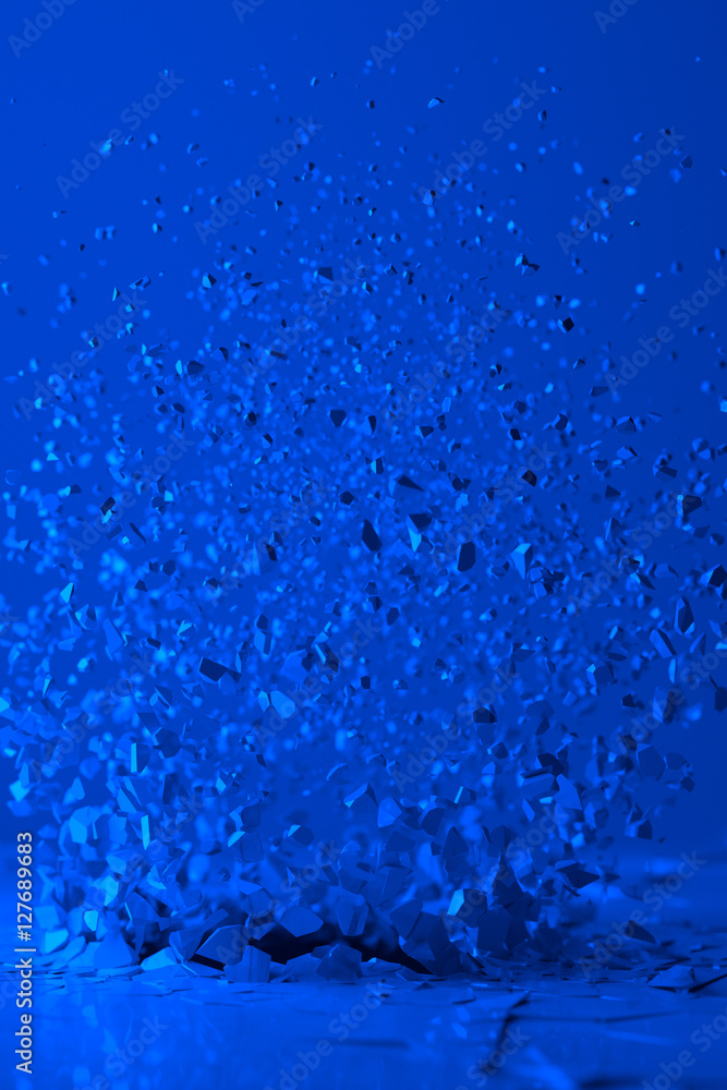 Obraz premium Shattered porcelain in blue light