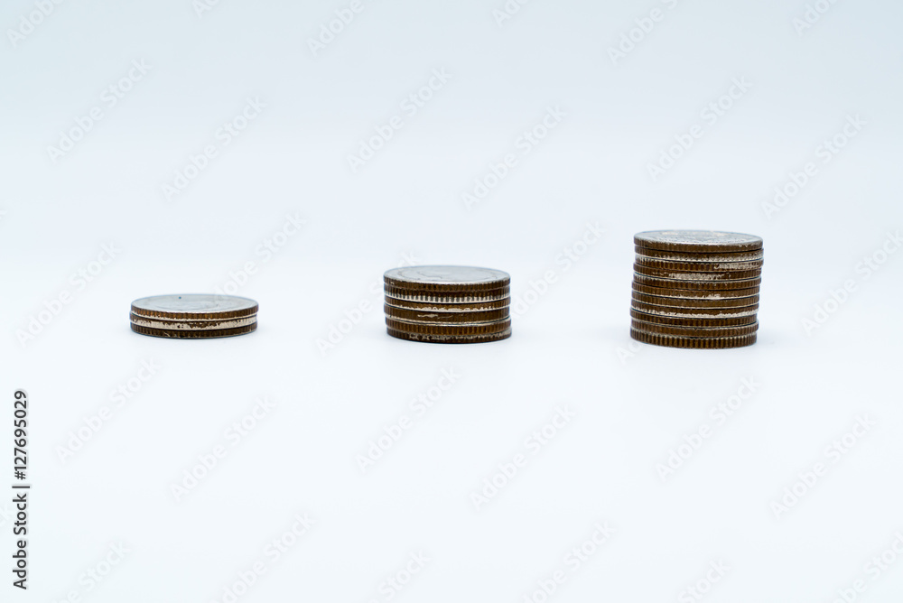 Stacks of money, Thai coins of five bath isolated on white background Stacks of money, Thai coins of five bath isolated on white background