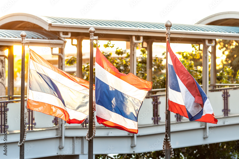 Thai Flag. The three Thai Flag Flab in the evening warm light.