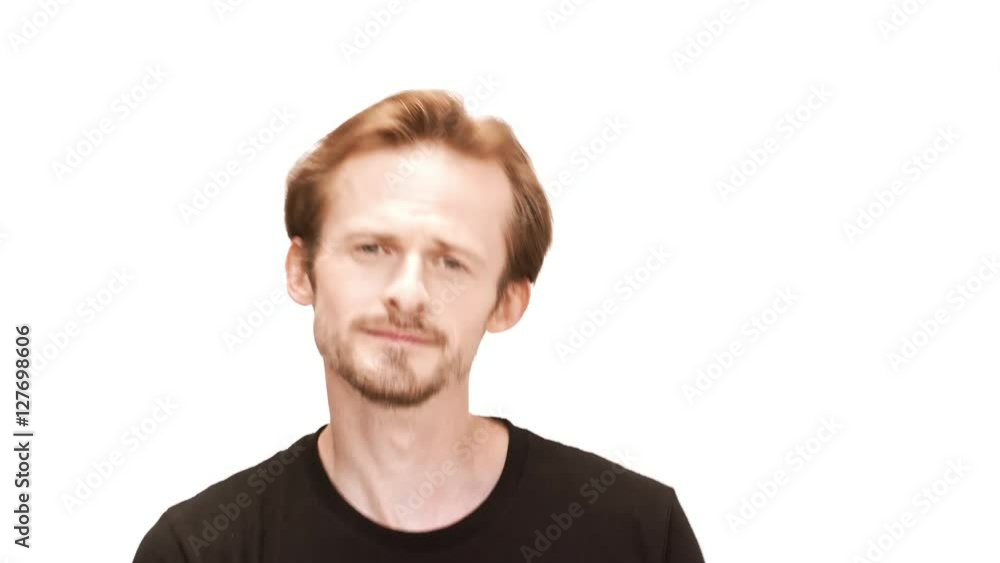 Young handsome man singing, dancing, smiling over white background. Young handsome man singing, dancing, smiling over white background.