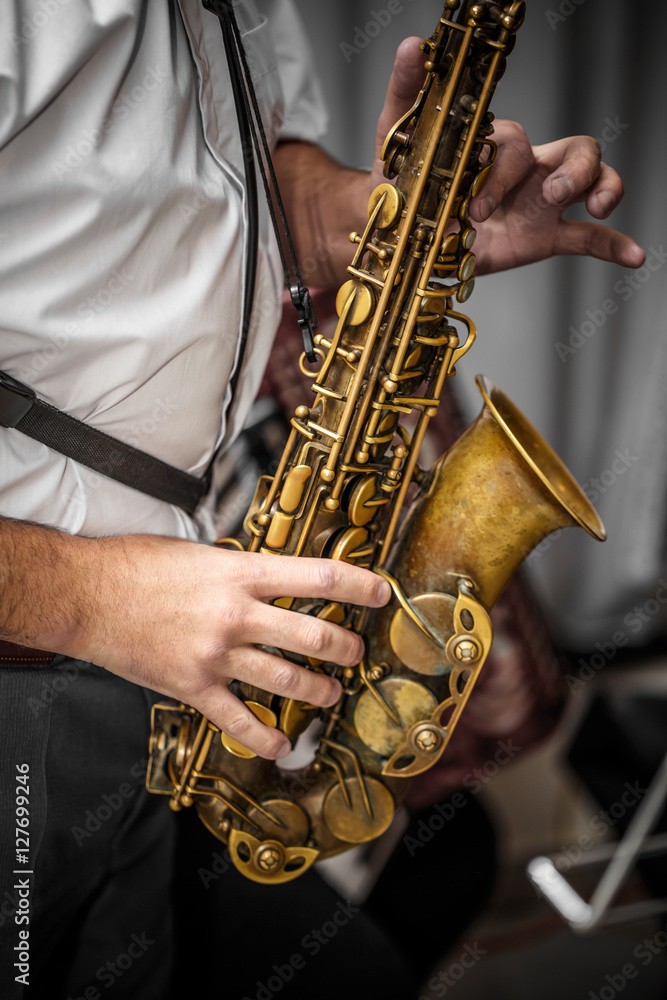 Naklejka premium Musician playing the saxophone