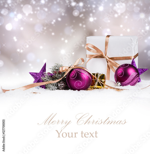 Christmas decoration in snow background with free space. Celebration balls and other decoration. Christmas concept