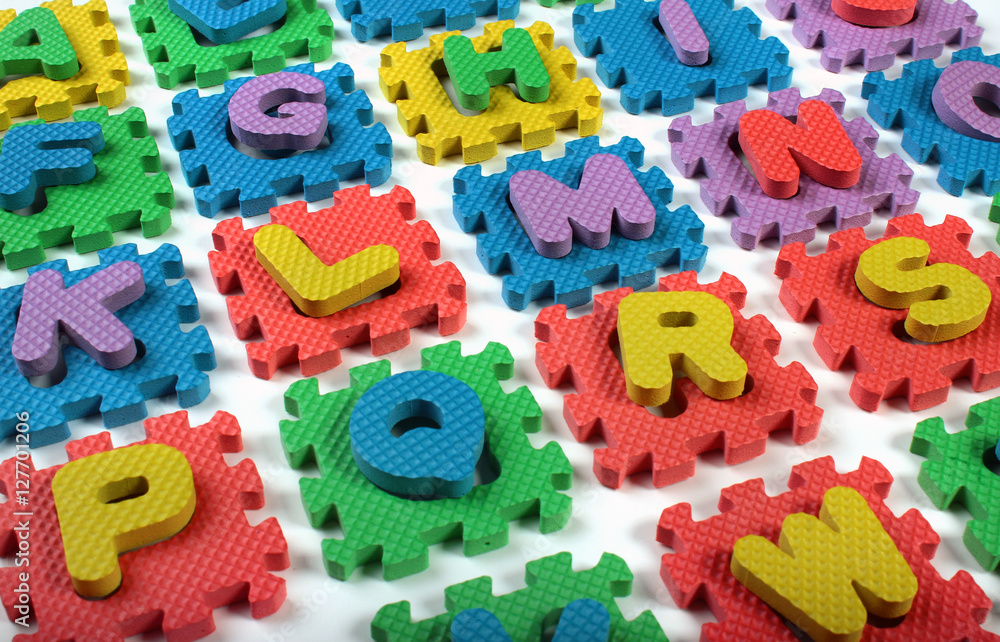 Cut out letters of toy plastic alphabet