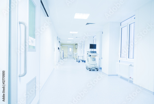 modern hospital corridor lit by a bright light