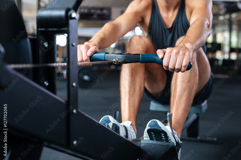 Cropped image of fitness man doing exercise Cropped image of fitness man doing exercise