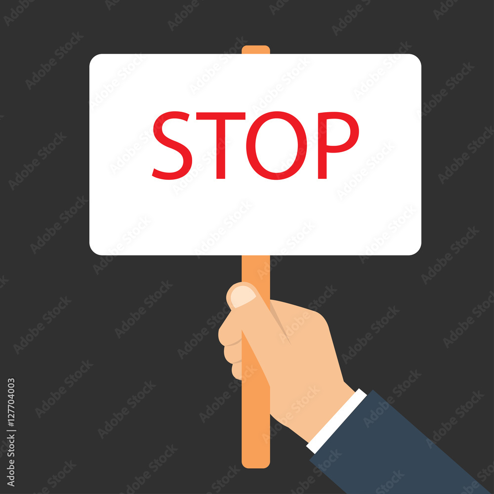 Hands holding protest signs Hands holding protest signs