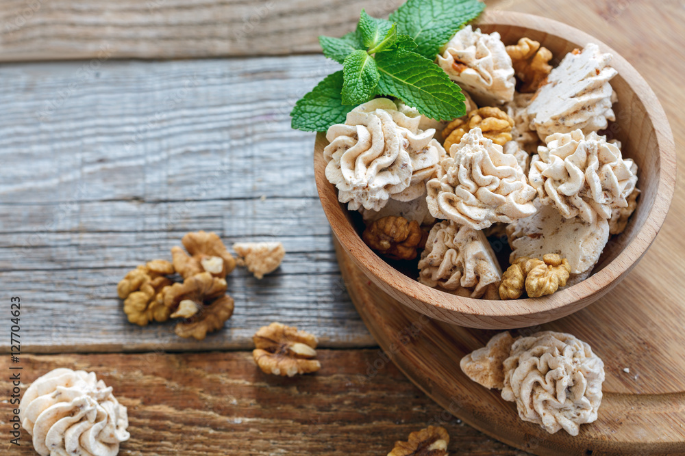Fototapeta premium Delicate meringue with nuts.