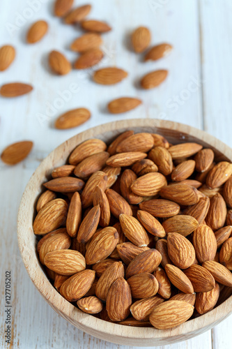 Almonds in a wooden bowl.