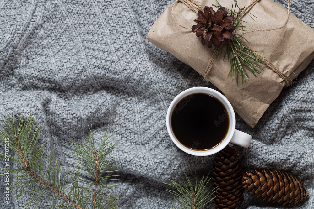 New Year's background. coffee and Christmas toys and warm scarves. New Year's background. coffee and Christmas toys and warm scarves.