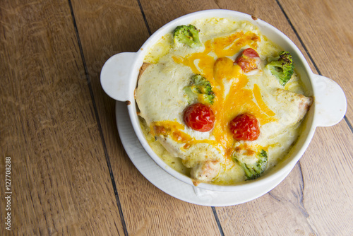 Chicken Enchilada Casserole with tomato and broccoli