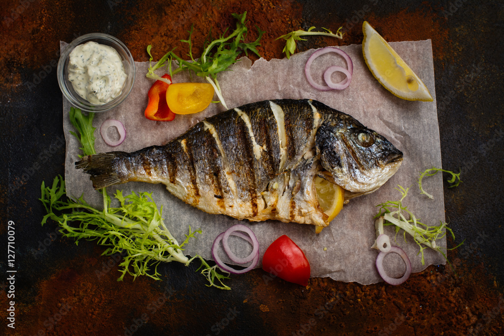 Delicious grilled dorado with vegetables Delicious grilled dorado with vegetables