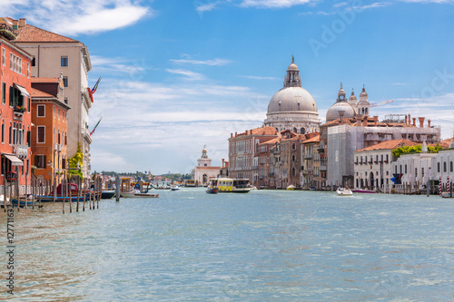 view of Grand Canal with colorful houses and ancient church, Ven