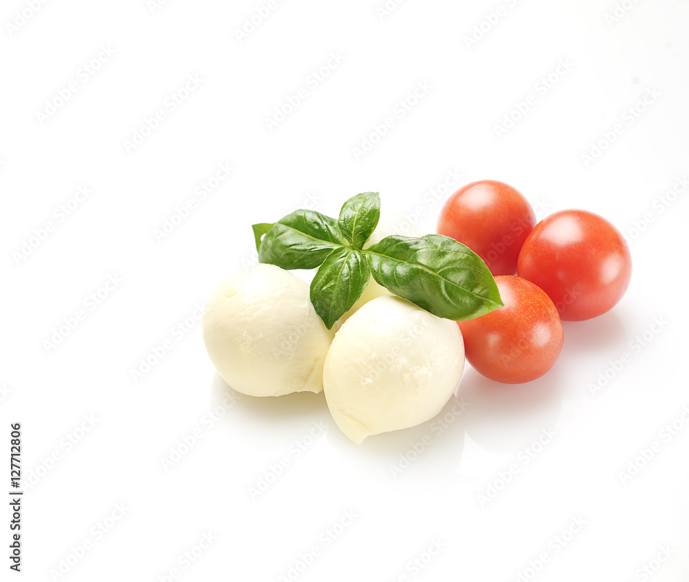 mozzarella, basil and cherry tomatoes on a white background mozzarella, basil and cherry tomatoes on a white background