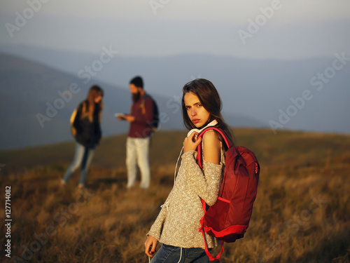 girl with backpack on mountain © Volodymyr