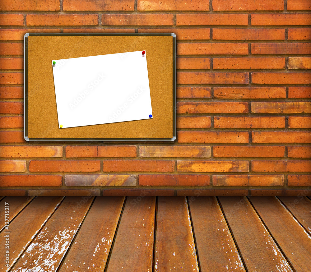 board in interior room with brick wall background board in interior room with brick wall background