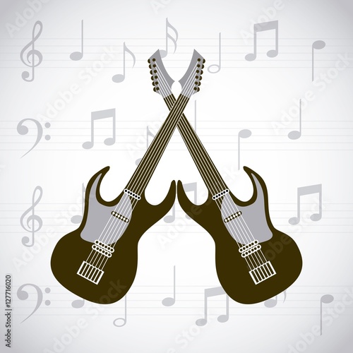 electric guitars crossed over white background with musical notes. vector illustration photo