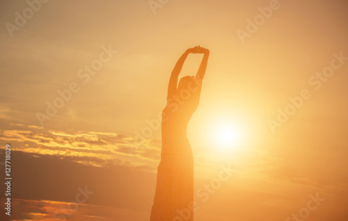 Young woman raise hands up for her success, Concept of Success i