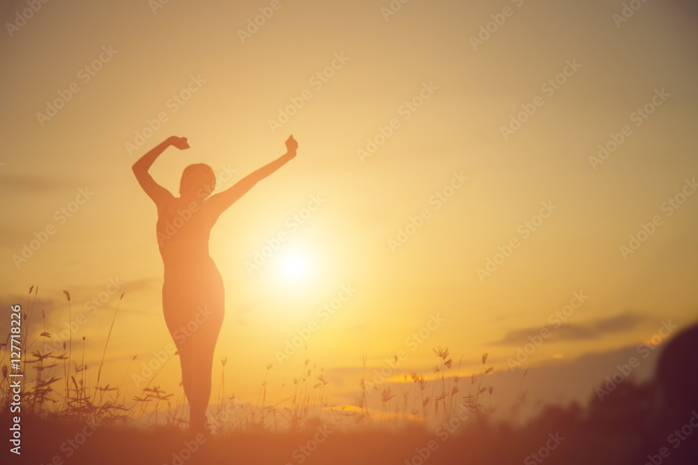 Young woman raise hands up for her success, Concept of Success i