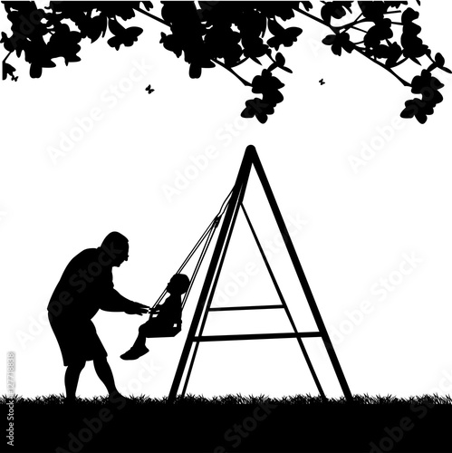 Grandfather swinging grandson on a swing in the park, one in the series of similar images silhouette