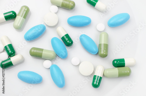 Blue and green pills