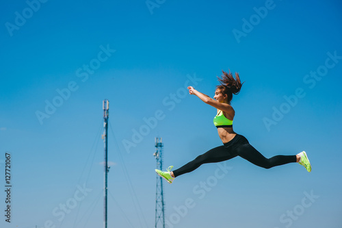 sports girl against the sky