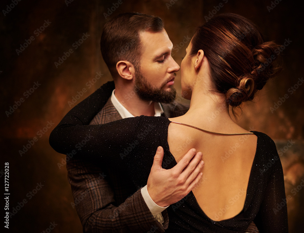 Portrait of well-dressed couple in expression of feelings Portrait of well-dressed couple in expression of feelings