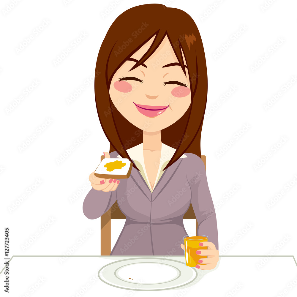 Happy beautiful brunette woman having breakfast eating tasty toast with butter and drinking orange juice